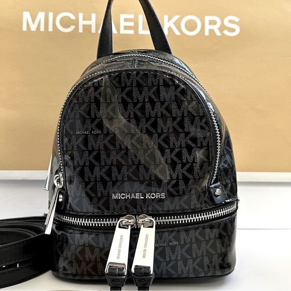 Michael Kors Handbags - MICHAEL Michael Kors Mini Rhea Backpack Bag MK Monogram Sparkle